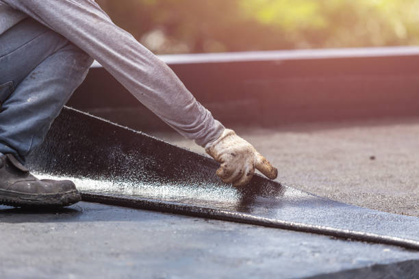 Professional Exterior Waterproofing technician working in Weehawken, NJ